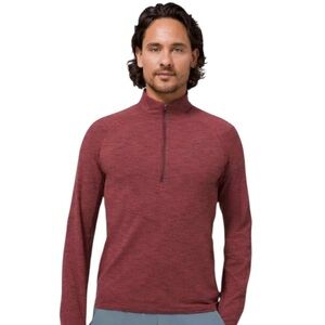 Lululemon Surge Warm 1/2 Zip in Heathered Rust and black size Large